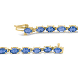 10K Yellow Gold and 4 Prong Set 6X4 MM Blue Topaz Link Tennis Bracelet - Size 7 Inches